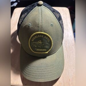 Overlook Hotel from The Shining film.  Green Trucker Hat.